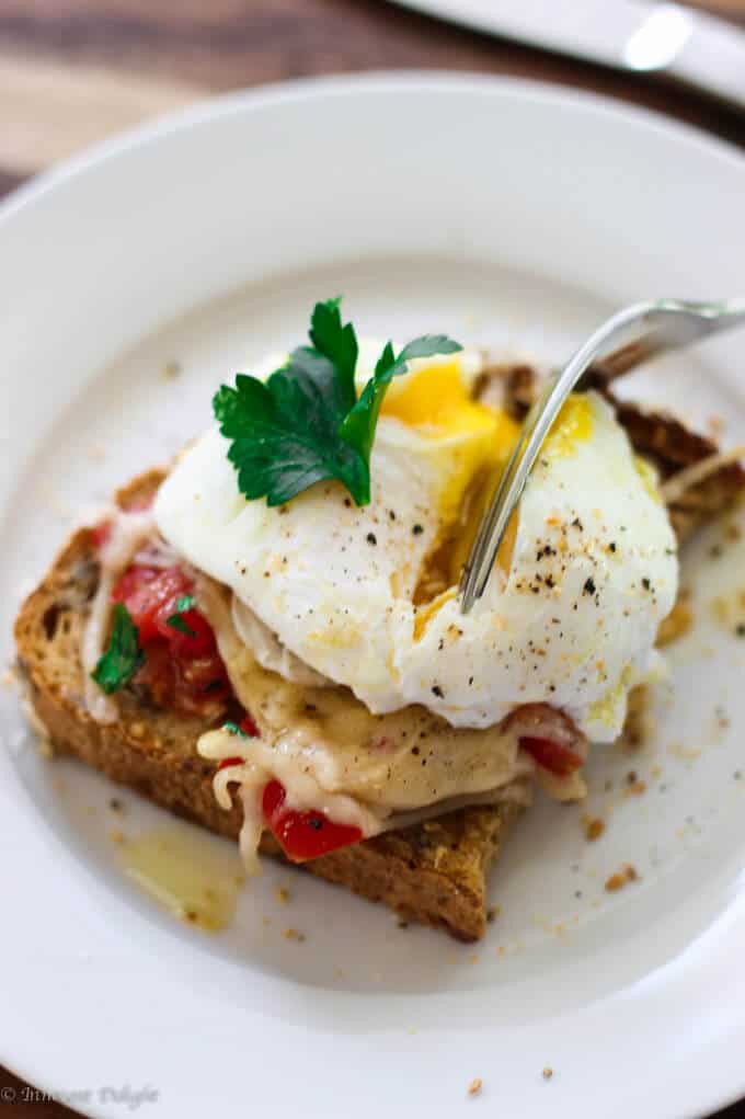 Poached egg on parmesan tomato toast