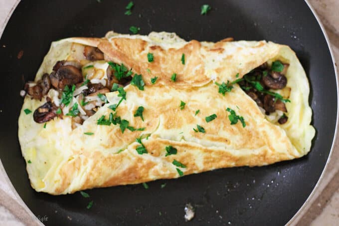 Omelet with mushrooms, onions and mozzarella