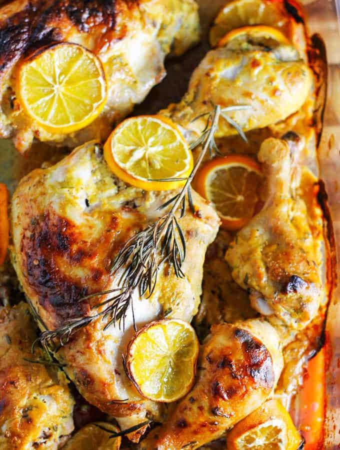 Dijon Chicken with Meyer Lemons and rosemary in a baking dish