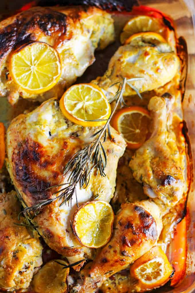 Dijon Chicken with Meyer Lemons and rosemary in a baking dish