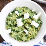 Greek Rice with Spinach served in a bowl with Feta Cheese