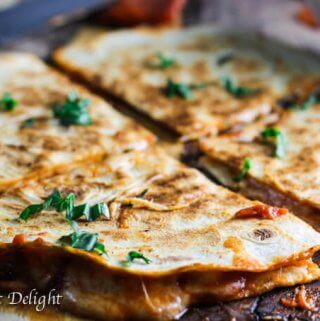 Margarita Pizza Quesadillas combine two of the most popular Italian and Mexican dishes - pizza and quesadillas. Listen, if 1 is good...2 is better!
