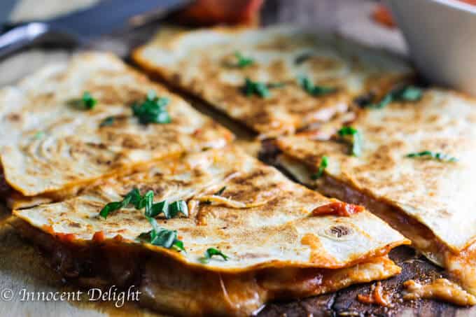 Margarita Pizza Quesadillas combine two of the most popular Italian and Mexican dishes - pizza and quesadillas. Listen, if 1 is good...2 is better!