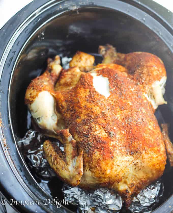 Only 5 minutes of preparation is needed for this  amazing Slow Cooker Whole Roasted Chicken. Spice it up. Set it and forget it. The most juicy chicken you could ever imagine. 