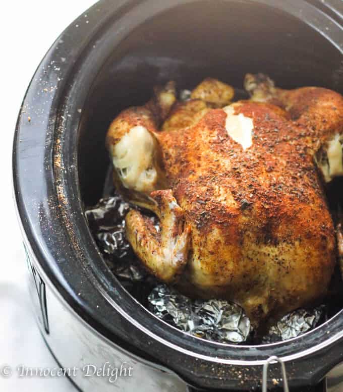 Only 5 minutes of preparation is needed for this  amazing Slow Cooker Whole Roasted Chicken. Spice it up. Set it and forget it. The most juicy chicken you could ever imagine. 