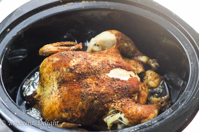 Only 5 minutes of preparation is needed for this  amazing Slow Cooker Whole Roasted Chicken. Spice it up. Set it and forget it. The most juicy chicken you could ever imagine. 