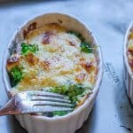 Broccoli Au Gratin is a delicious dish of American favorite vegetable topped with amazing cheesy sauce that is baked to perfection. Few simple ingredients mixed with sophisticated Gruyere cheese makes this dish both rustic and elegant. Even broccoli skeptics can become a fans.