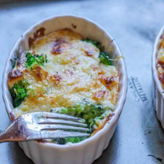 Broccoli Au Gratin is a delicious dish of American favorite vegetable topped with amazing cheesy sauce that is baked to perfection. Few simple ingredients mixed with sophisticated Gruyere cheese makes this dish both rustic and elegant. Even broccoli skeptics can become a fans.
