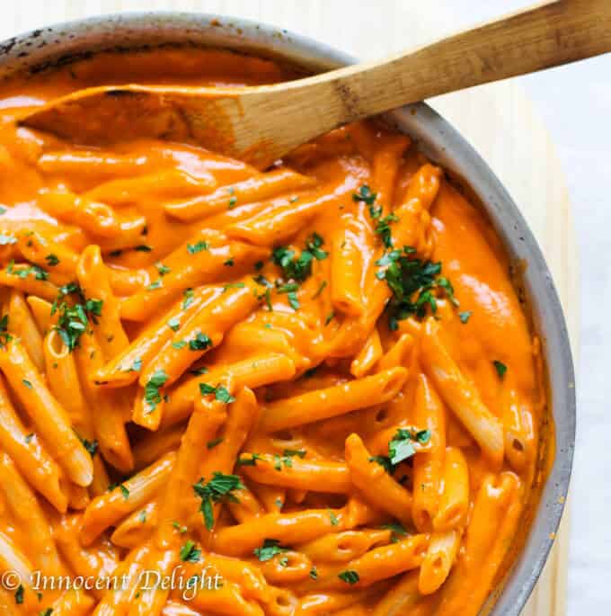 Penne alla vecchia bettola in a skillet with spoon