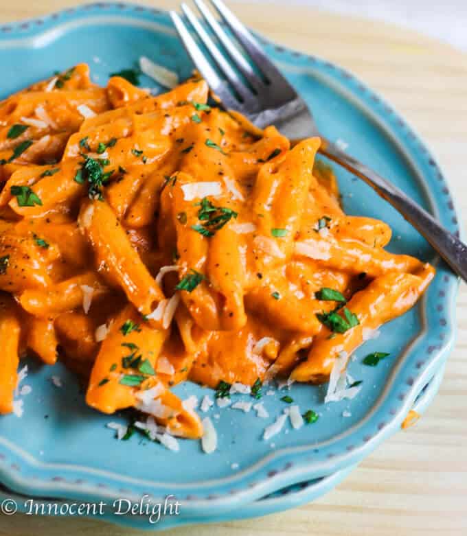 Pasta alla vecchia bettola on blue plate with fork