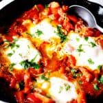 Mediterranean Diet Breakfast (Eggs in Pepper Tomato Sauce) in a skillet
