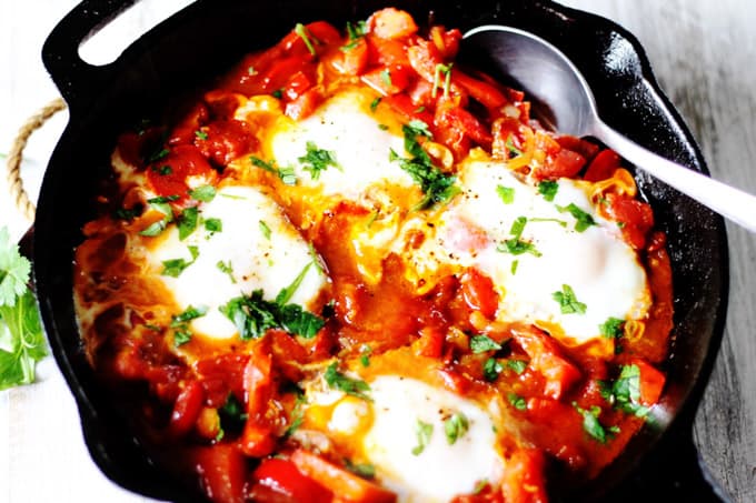 Mediterranean Diet Breakfast (Eggs in Pepper Tomato Sauce) in a skillet