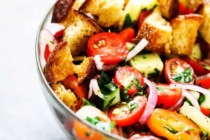 Pnzanella bread salad in a glass bowl