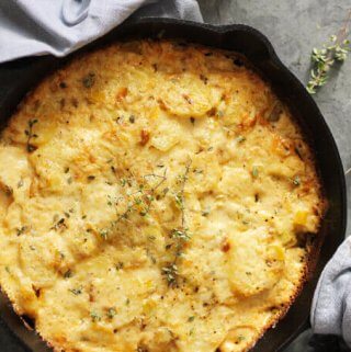 Potato Leek Casserole - ultimate comfort food side dish that resembles in taste famous Potato Leek Soup; topped with cream and Gruyer Cheese, rich, decadent, elegant and delicious casserole- Innocent Delight