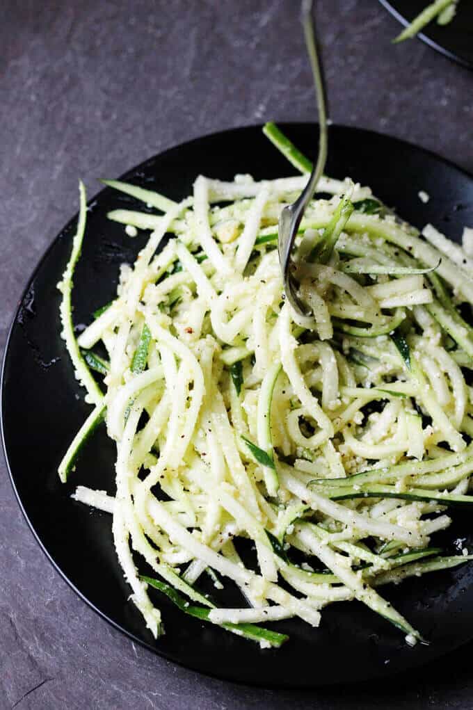 Cacio e Pepe Zucchini Noodles recipe is a perfect combination of one of the most famous Italian pastas with a healthy spiralized vegetable. It requires no cooking and can be served as main or side dish.