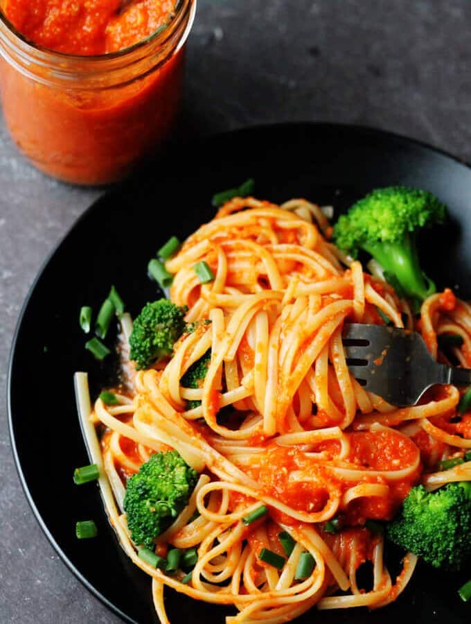 Linguine with Broccoli and Romesco Sauce is an amazing pasta dish with a uniquely Spanish twist. Freshly cooked linguine is tossed with broccoli and a sauce made of roasted red peppers, tomatoes, onions and toasted almonds. Simply delicious.