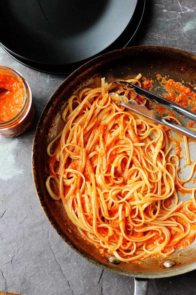 Linguine with Broccoli and Romesco Sauce is an amazing pasta dish with a uniquely Spanish twist. Freshly cooked linguine is tossed with broccoli and a sauce made of roasted red peppers, tomatoes, onions and toasted almonds. Simply delicious.