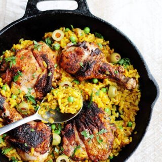 One Pot Chicken Saffron Rice with Olives and Piementon is an easy weeknight meal that requires minimum work. The oven does the job for you