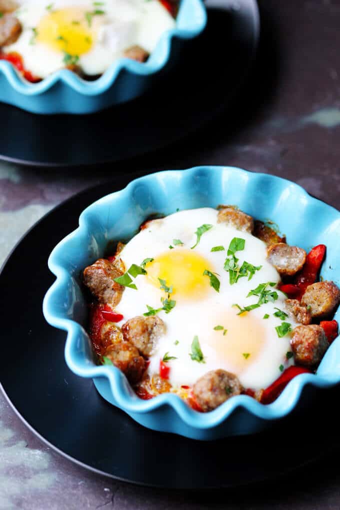 Oven Baked Eggs with Sausage, Peppers & Onions are super easy to make yet absolutely delicious. They're also elegant and perfect for special occasions, like Mother's Day.