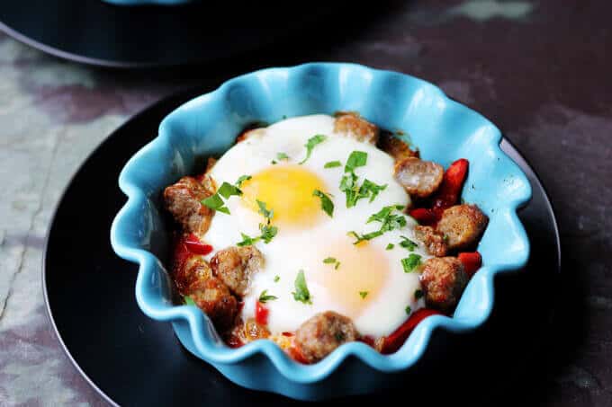 Oven Baked Eggs with Sausage, Peppers & Onions is super easy to make yet absolutely delicious. It's also elegant and perfect for special occasions like Mother's Day.