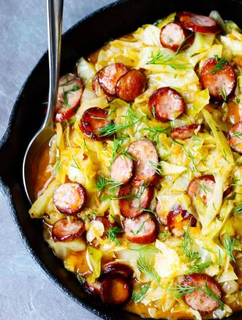 Cabbage and Kielbasa come together to form a perfect Polish summer hunter's stew. It's made from young cabbage, that is at its peak at the begging of the summer, with the addition of a smoky Polish sausage and a fragrant dill. It makes for a delicious European treat.