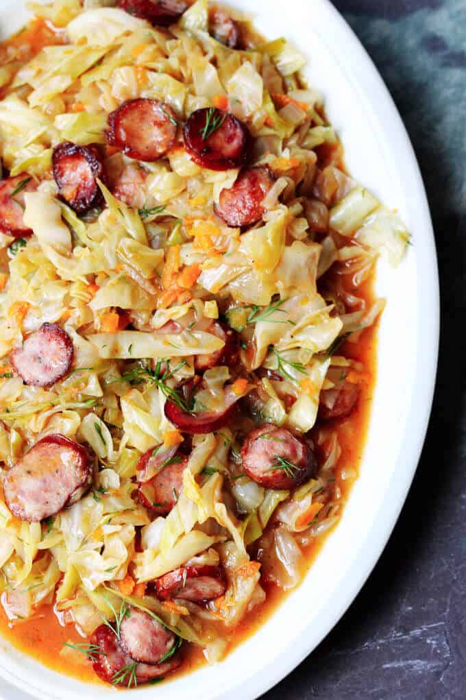 Summer hunter's stew with kielbasa and cabbage on a serving plate