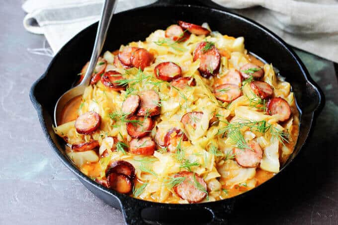 Cabbage and Kielbasa come together to form a perfect Polish summer hunter's stew. It's made from young cabbage, that is at its peak at the begging of the summer, with the addition of a smoky Polish sausage and a fragrant dill. It makes for a delicious European treat.