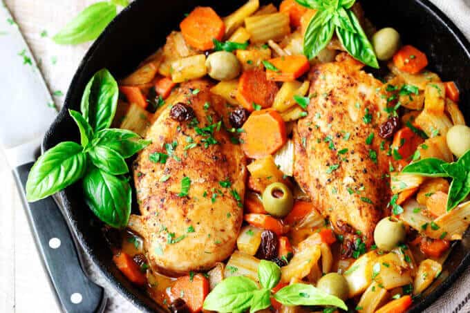 Fennel Chicken Mediterranean Style with carrots, raisins and olives is a very easy, one pot meal recipe for any day of the week. It is seasoned with cinnamon, cumin and smoked paprika for an irresistible and flavorful chicken dish.
