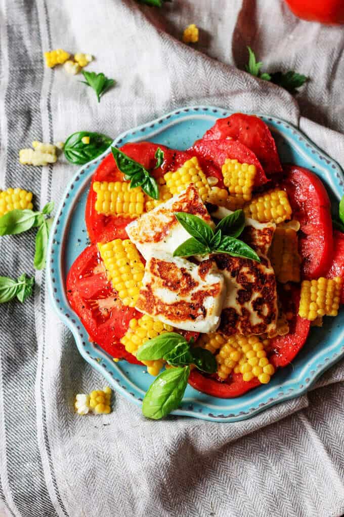 Fried Halloumi Cheese with Corn and Tomatoes is an amazing summer appetizer. This humble cheese from Cyprus will make for an unforgettable experience.