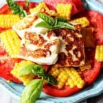 Fried Halumi Cheese with Corn and Tomatoes is an amazing summer appetizer. This humble cheese from Cyprus will make an unforgettable experience.
