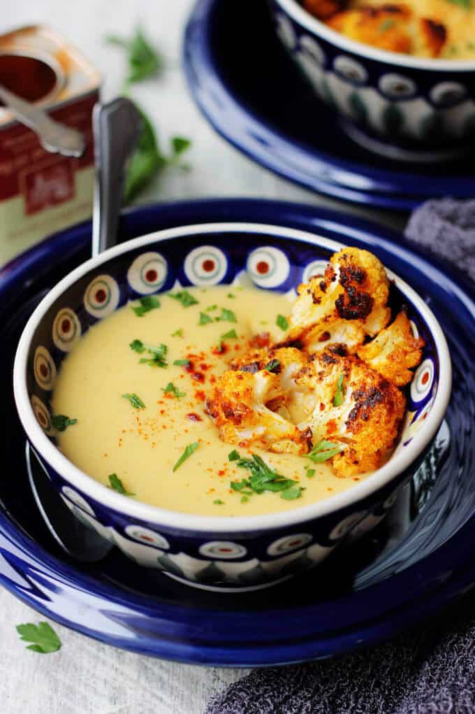 Roasted Cauliflower Soup with Smoked Paprika & Coconut Milk is a very flavorful and comforting soup. Spanish smoked paprika adds a little spice while coconut milk smooths it down to create a perfect balance.