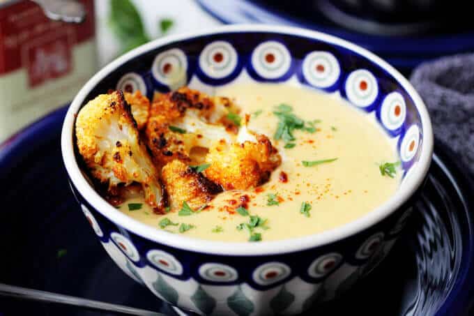 Roasted Cauliflower Soup with Smoked Paprika & Coconut Milk is a very flavorful and comforting soup. Spanish smoked paprika adds a little spice while coconut milk smooths it down to create a perfect balance.