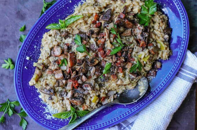 Wild Mushroom Risotto with Bacon and Leeks on a serving plate