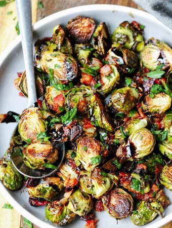 Balsamic Glazed Brussels Sprouts with Bacon is a perfect side dish for any Holidays. It can be done in 20 minutes while your turkey is out of the oven and resting.
