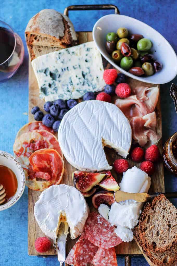 Building the Perfect French Cheese Board can be easier then one might think. This guideline for cheese and wine pairings will help to make any appetizer round super easy, and without losing elegance and sophistication. #ad #madeinfrance #madewithlove