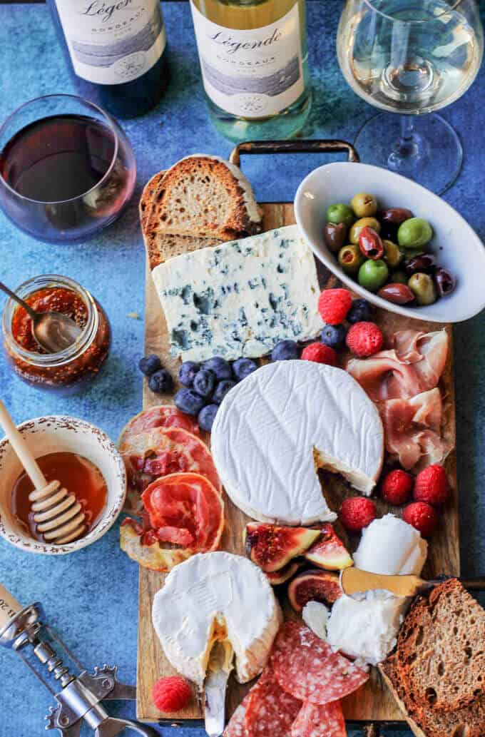 Building the Perfect French Cheese Board can be easier then one might think. This guideline for cheese and wine pairings will help to make any appetizer round super easy, and without losing elegance and sophistication. #ad #madeinfrance #madewithlove