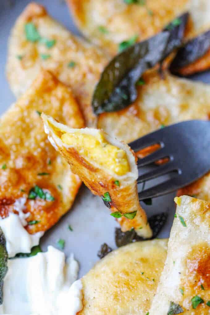 Roasted Butternut Squash Feta Pierogi is an amazing dish that combines American fall flavors with a taste from the Greek islands, wrapped in Polish dough