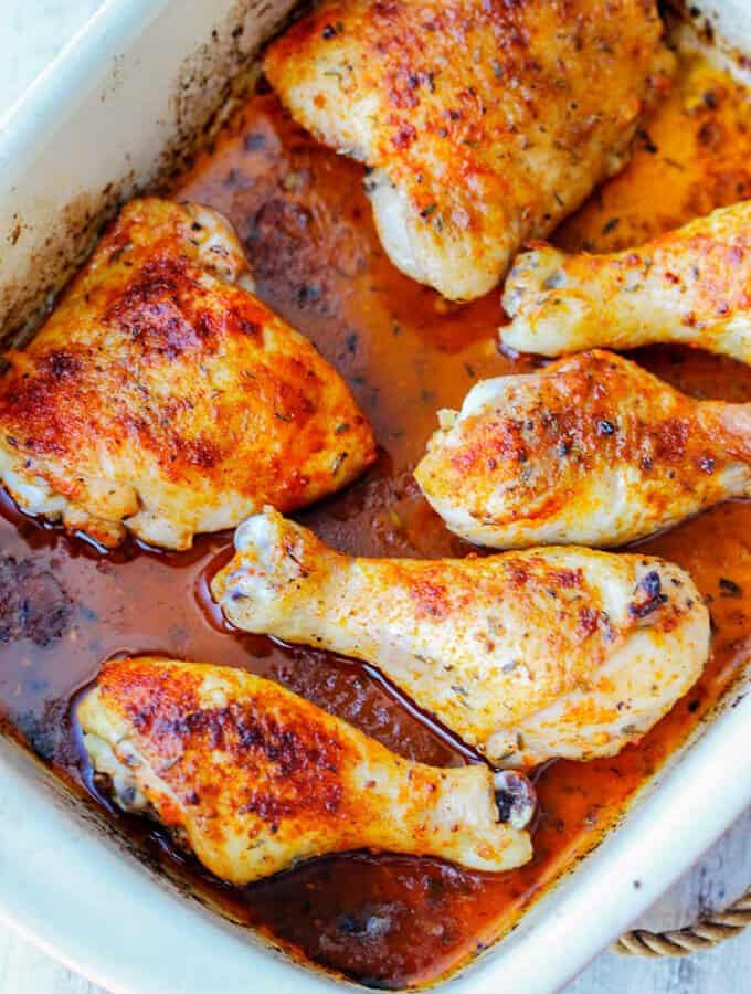 Oven roasted chicken legs (tights and drumsticks in the casserole dish, diagonal