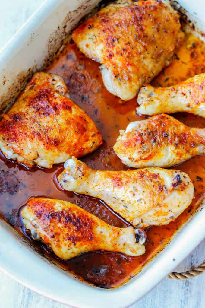 Oven roasted chicken legs (tights and drumsticks in the casserole dish, diagonal 