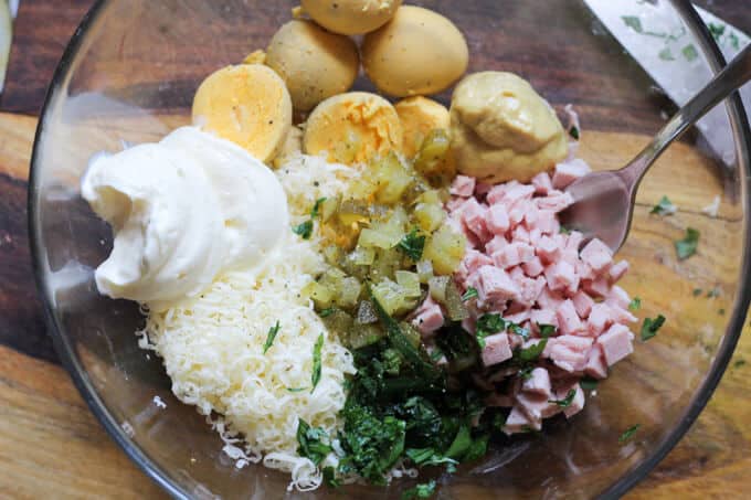 ingredients for stuffed eggs in a bowl