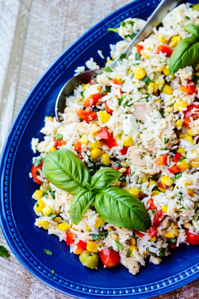 Italian rice tuna salad on a blue serving plate