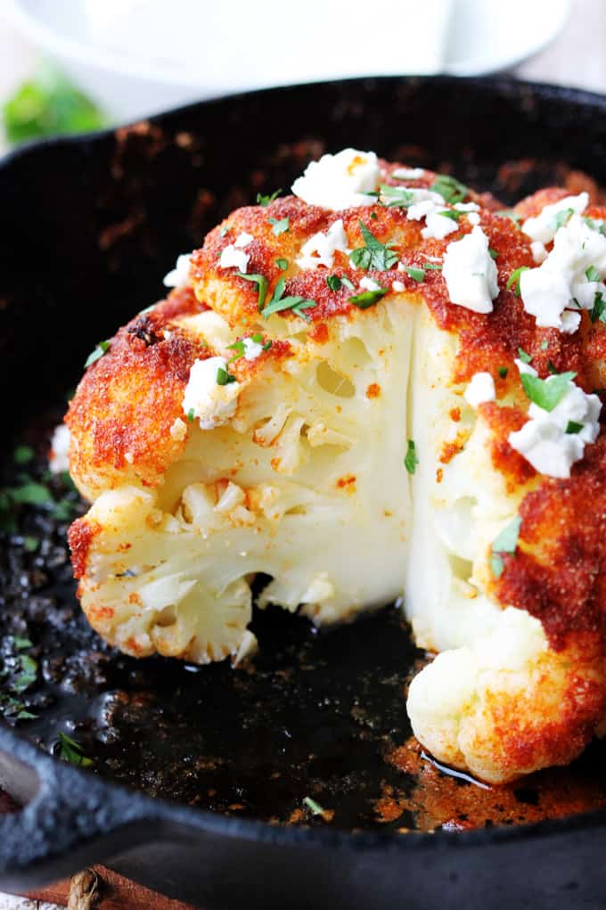 Whole roasted cauliflower with spices and feta