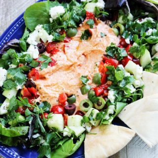 Mediterranean platter with hummus, veggies and pita bread