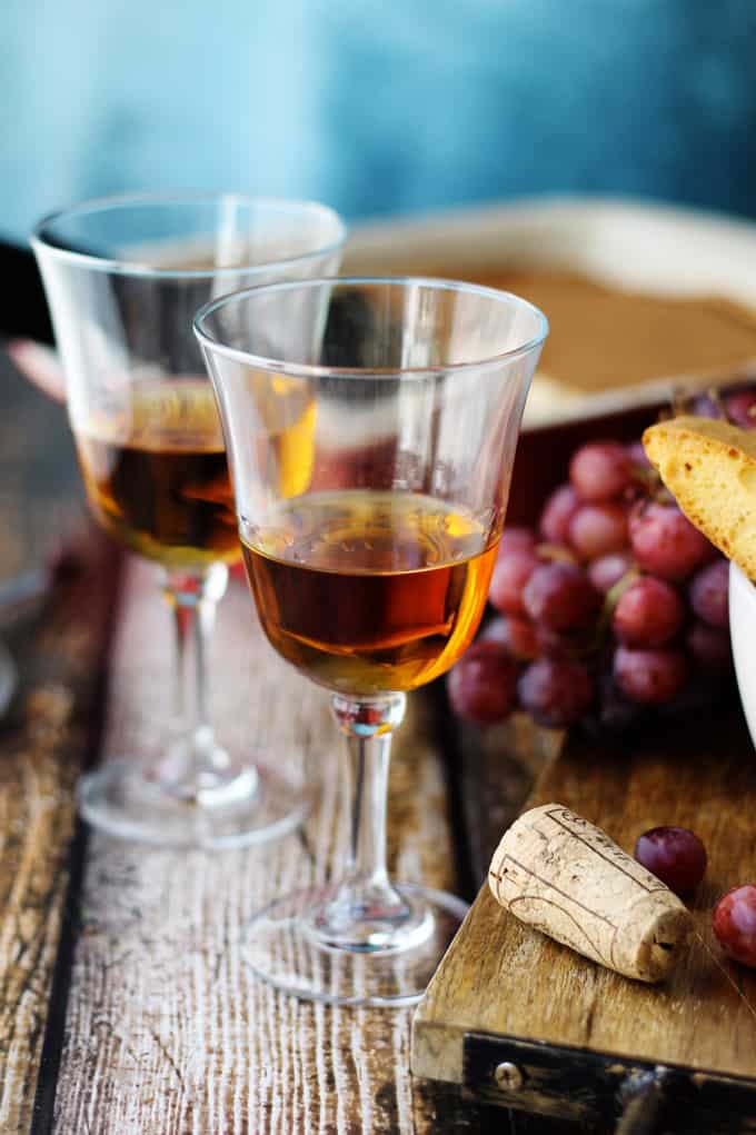 Italian Dessert Wine Vin Santo with grapes on a side