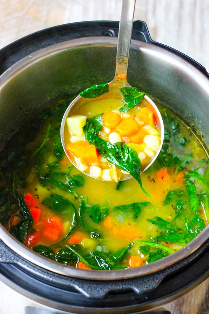 Serving Instant Pot Bean Soup with Laddle