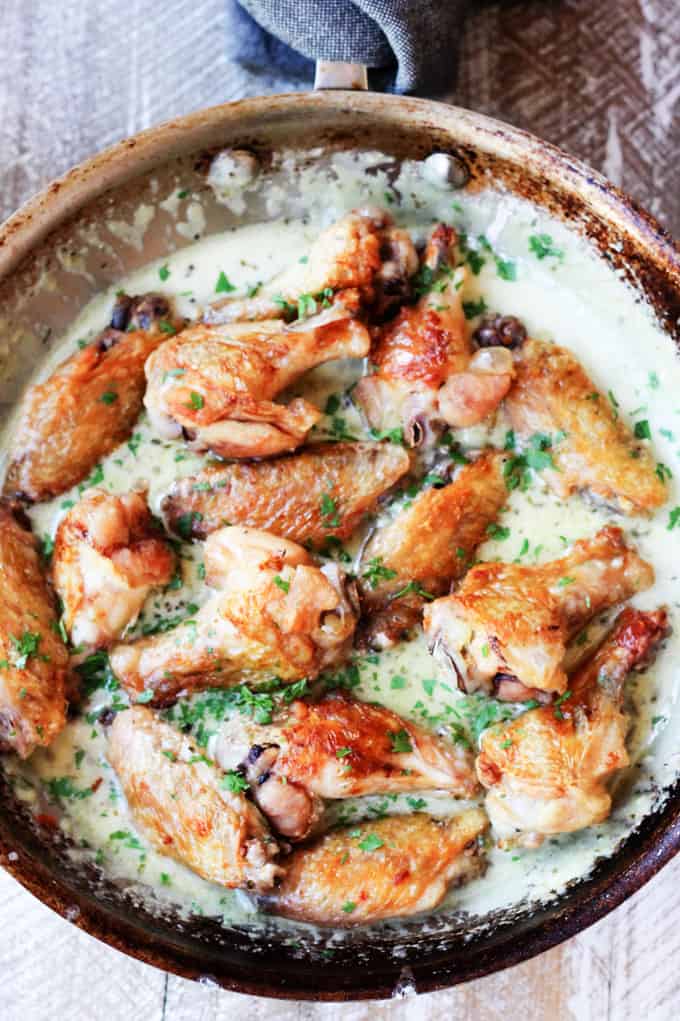 Parmesan Garlic Chicken Wings in a skillet