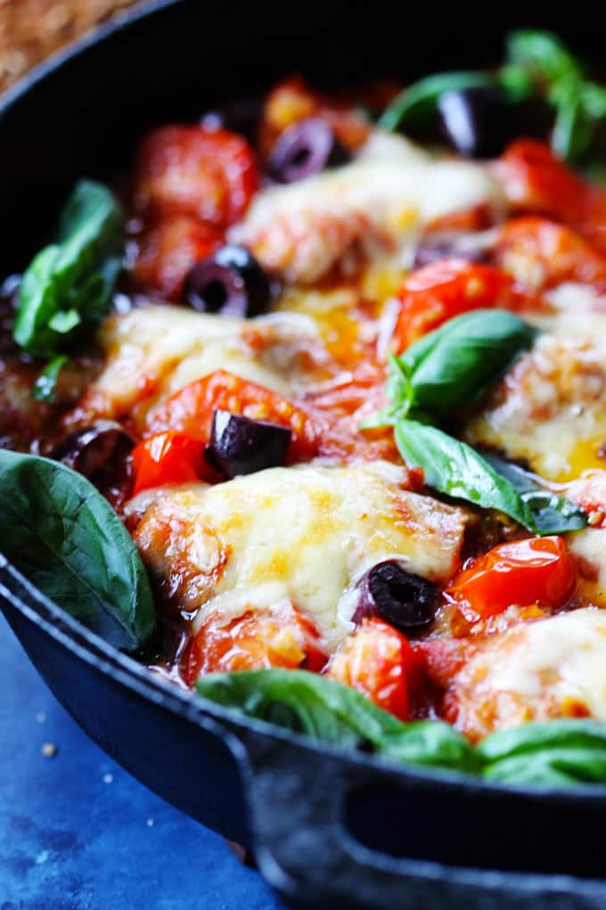 Veal Rollatini in Tomato Basil Sauce with Cheese in a skillet