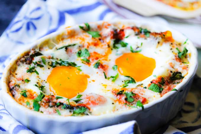 Baked Eggs in Tomato Spinach Cream Sauce - Eating European