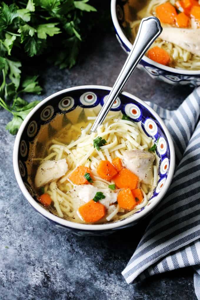 Rosol Polish Chicken Soup in a pretty bowl with a spoon