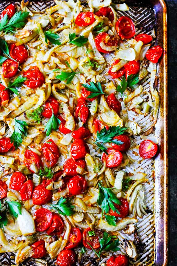 Tomatoes and fennel roasted on baking sheet